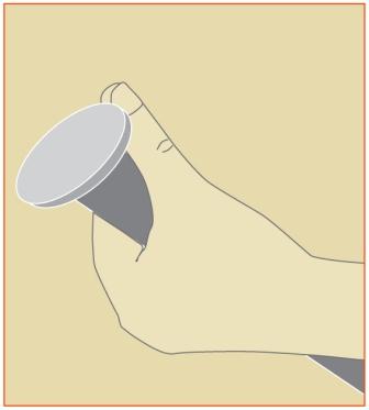 Image of ski pole and thumb